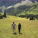 Man and woman hiking in mountain landscape, Alta Badia, Italy - VideoHive Item for Sale
