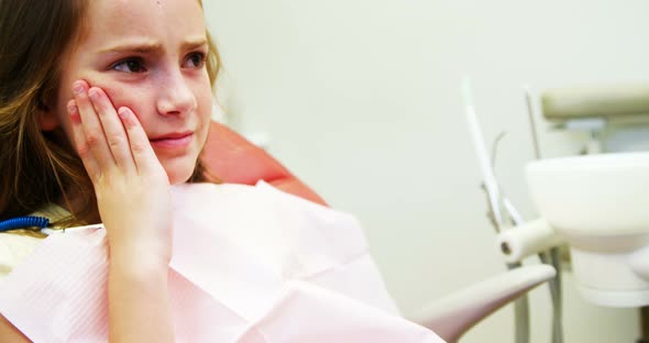 Unhappy young patient having a toothache