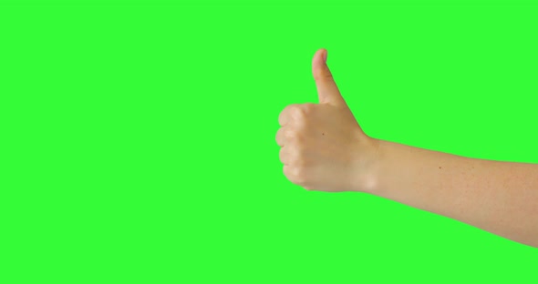 Isolated Woman Hand Showing Thumbs Up or Like Sign Symbol, Green Screen, Body Language