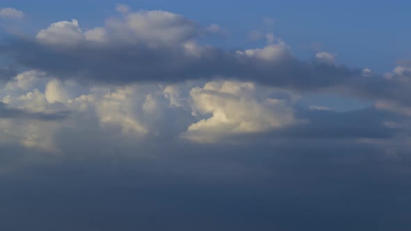 Lightning Sparkles After Gray Clouds Close the Blue Sky