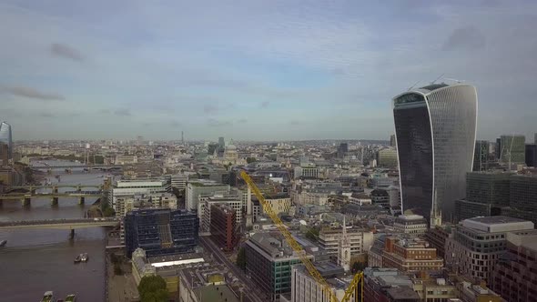 Panoramic aerial view of downtown London, including the Thames River and the Shard