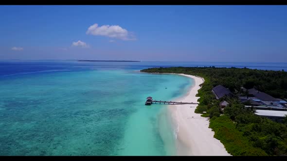 Aerial top down nature of paradise shore beach adventure by blue lagoon with white sand background o