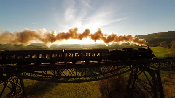 Old Retro Vintage Locomotive Train Crossing Railroad Bridge