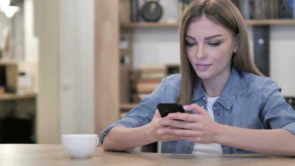 Young Girl Using Smartphone