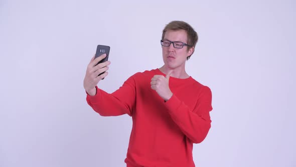 Happy Young Handsome Man Taking Selfie