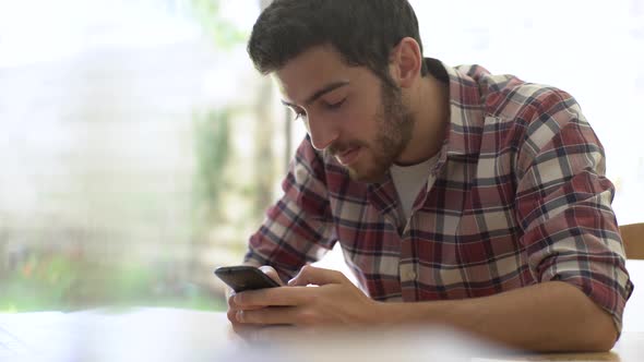 Man using smart phone