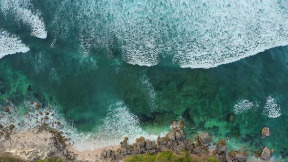 Beautiful Blue Sea Waves Splashing Towards a Beautiful Rocky