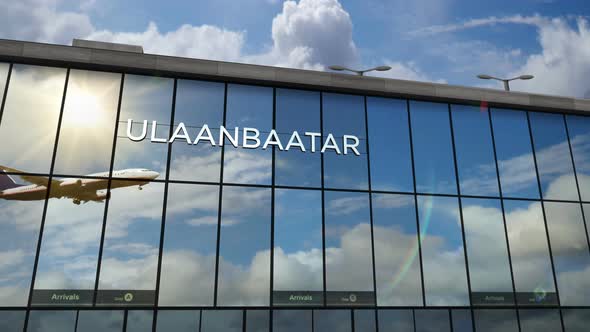 Airplane landing at Ulaanbaatar Mongolia airport mirrored in terminal