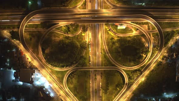 4K : Aerial Hyper lapse drone view of road junction with moving cars.