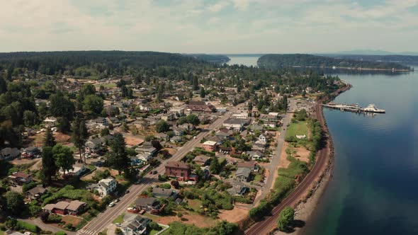 A Train moves along Waterfront Track in Puget Sound at Steilacoom Washington