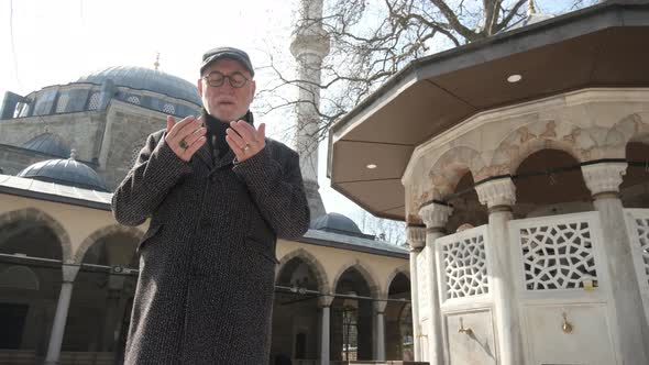 Man In Front Of Ottoman Mosque