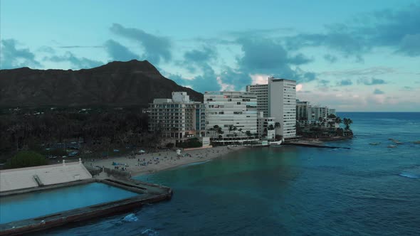 Aerial drone footage of Honolulu, Hawaii. Beautiful real estate, buildings in the city. Palm trees