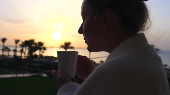 Woman Holding Coffee Cup In Hotel Terrace Over Sea View, Good Morning Concept