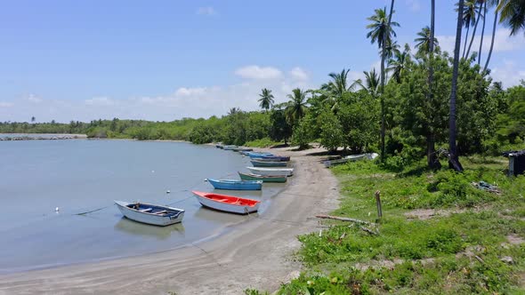 Fishing boats anchored at beach close to the Soco river mouth; aerial