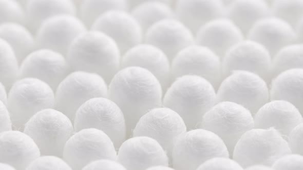 Closeup Spinning Fullframe Macro Background of Cotton Earbud Heads