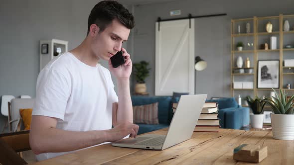 Man Discussing Plan on Phone Call