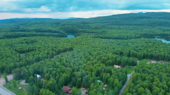 4K Drone Video of Lakes and Cabins in Forest near Talkeetna, AK on Summer Evening