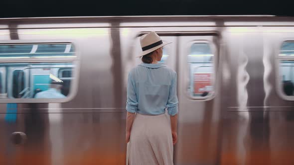 Young tourist at subway station 