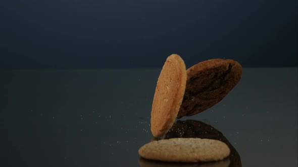 Cookies falling and bouncing in ultra slow motion 1500fps - reflective surface - COOKIES