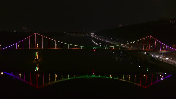 The Pedestrian Park Bridge over the Dnipro River in Kyiv City at Night