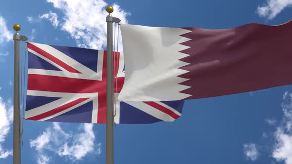 United Kingdom Flag Vs Qatar Flag On Flagpole