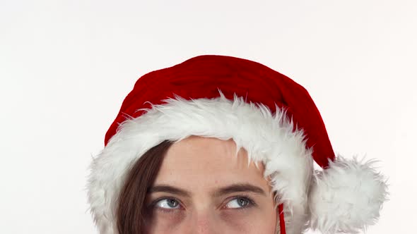 Eyes of a Woman in Christmas Hat Smiling To the Camera, Isolated