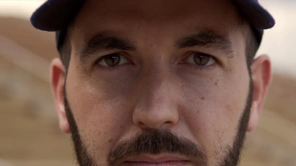 Outdoor Portrait of a Hispanic Man Looking at the Camera Seriously