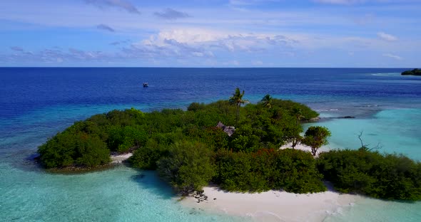 Luxury drone copy space shot of a white sandy paradise beach and blue ocean background in best quali