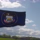 Utah Flag Waving in the Wind Blue Sky Background - VideoHive Item for Sale