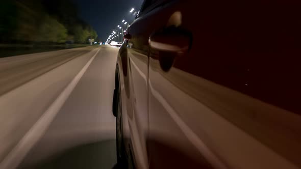 Drivelapse From Side of Car Moving on a Night Highway Timelapse Hyperlapse