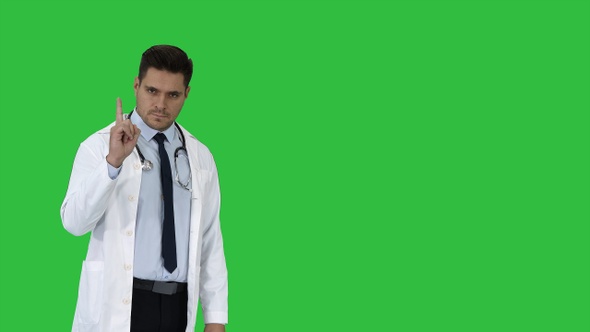 Doctor man medical professional making a point gesture