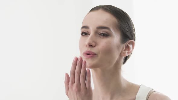 Air Kiss. Portrait Of Beautiful Smiling Woman Sending Kiss