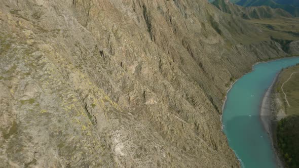 Aerial View Flying Near Rocky Terrain Structure Cracked Natural Ridge Texture Mountain River Valley