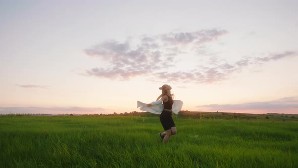 At Sunset Young Woman Enjoy the Moment at Sunset