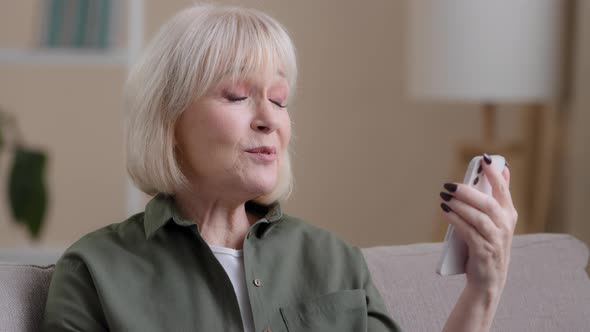 Old Talking Caucasian Blonde Wrinkled Grandmother Mature Senior Woman Elderly Female Has Video Call