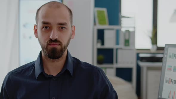 Close Up of Entrepreneur with Corporate Job Looking at Camera