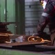 Heavy Industry Engineering Factory Interior with Industrial Worker Using Angle Grinder and Cutting a - VideoHive Item for Sale