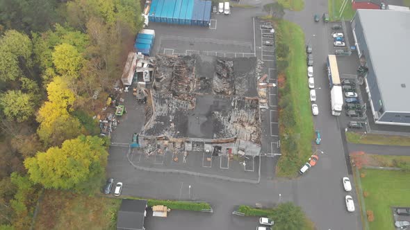 Industrial Building Burnt Down to the Ground Broken Roof Backwards Aerial