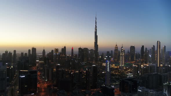 Aerial view of Dubai skyline at night, United Arab Emirates.
