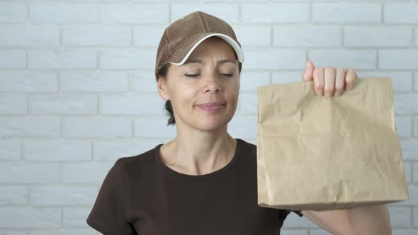 Woman with Food Bag Delivery