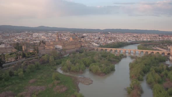 Aerial shot of Guadalquivir river and Cordoba