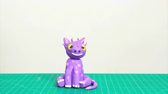 The Transformation of a Funny Purple Dragon From Plasticine Stop Motion Animation Claymotion