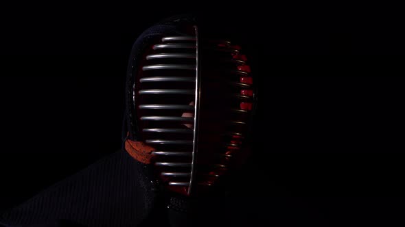 Close-up of Kendo Warrior in an Traditional Helmet.