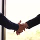 Two businessmen entrepreneurs or job interviews go well and shaking hands - VideoHive Item for Sale