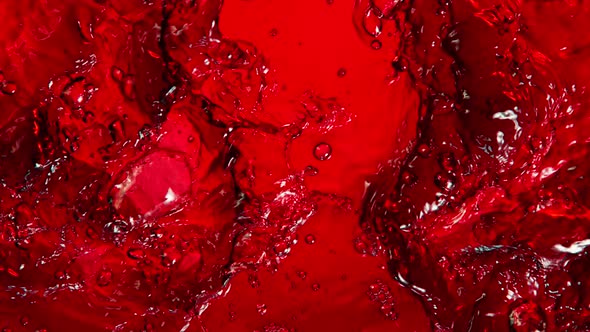 Super Slow Motion Shot of Rippling Fresh Red Wine Waves From Top Shot at 1000Fps.