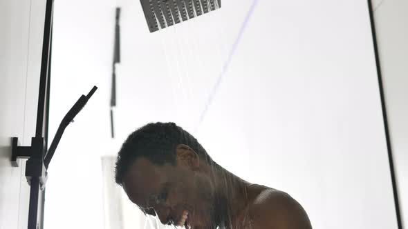 Positive AfricanAmerican Man Dances Taking Hot Shower