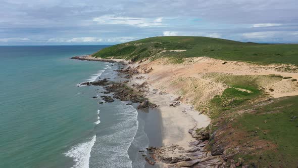 Sand dunes mountains and rain water lagoons at northeast brazilian paradise.