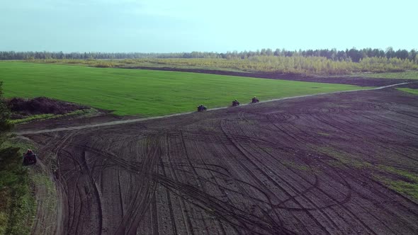 Quad Biking in the Field and Forest Aerial Photography