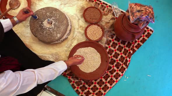 Crushing Wheat With Turning Stone To Make Flour 7