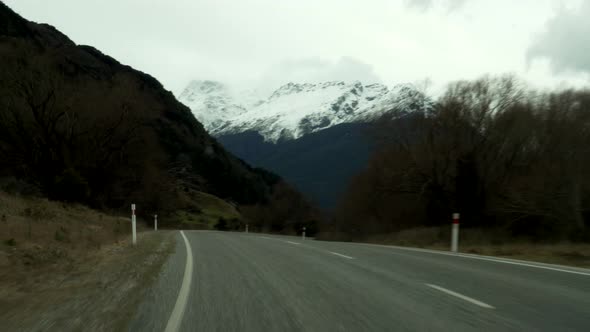 A first person view of driving through the beautiful country of New Zealand